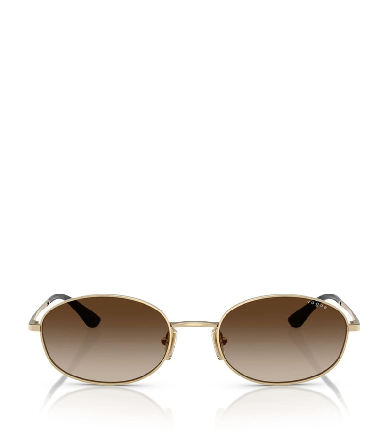 Vogue metal sunglasses with graduated tint lenses, imported from the UK