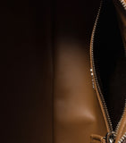 Miu Miu nappa leather top-handle bag with utility pockets (British brand)