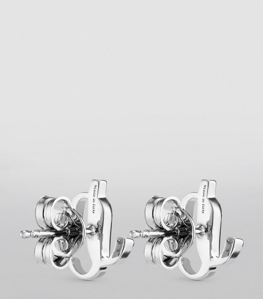 Jimmy Choo monogram stud earrings brass (British brand)