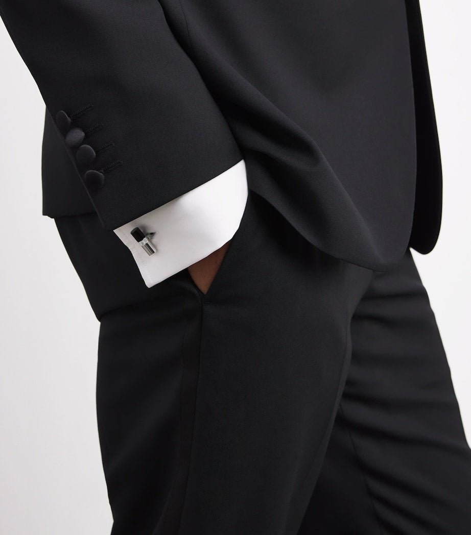 Babette Wasserman rhodium-plated stone bar cufflinks with onyx tips, imported from the UK
