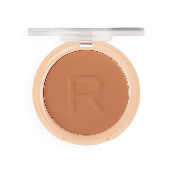 Revolution pressed powder makeup tan shade, imported from the UK