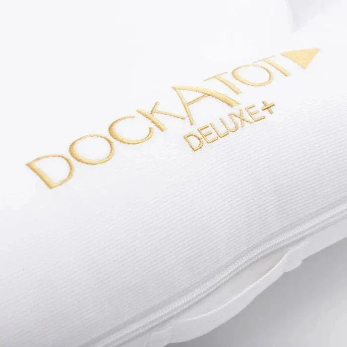 DockATot Deluxe+ Dock Pristine White baby lounger (British brand)