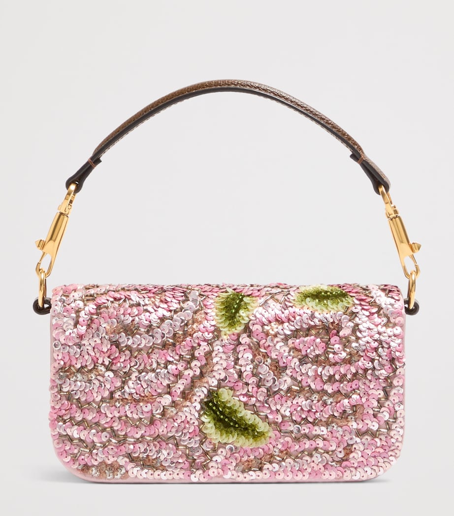Valentino Garavani small Locò shoulder bag with sequins, imported from the UK