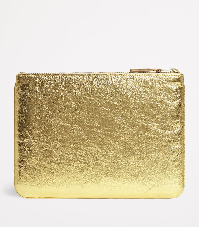 Comme des Garçons gold leather zipped pouch - British product
