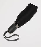 Tumi compact folding umbrella with water-resistant nylon panels (British brand)