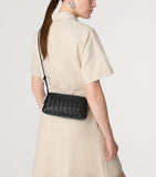Bottega Veneta leather Notturno pouch, imported from the UK