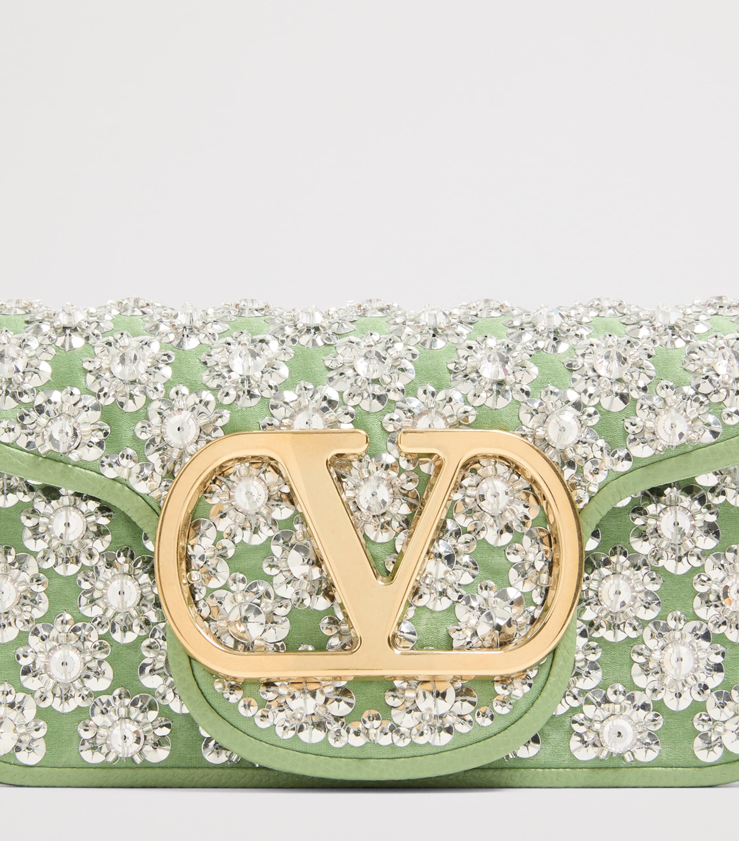 Valentino Garavani small Locò embellished shoulder bag, imported from the UK