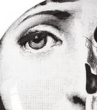 Fornasetti ashtray with face and skull design, number 288, approx. 3.5cm high and 13cm wide - British product