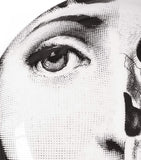 Fornasetti ashtray with face and skull design, number 288, approx. 3.5cm high and 13cm wide - British product