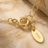 MUCHV gold square necklace with emerald green stone, imported from the UK