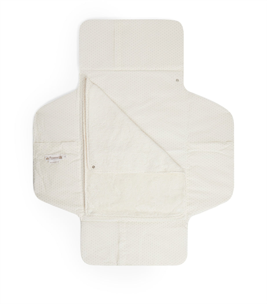 Bonpoint cotton changing mat with polka dot pattern and shearling interior, UK version