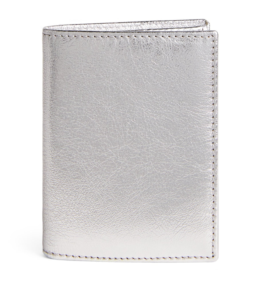 Comme Des Garçons leather folding card holder with silver metallic strip, UK version