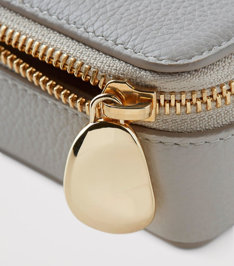 Monica Vinader compact leather jewellery box with zip fastening and multiple compartments, imported from the UK