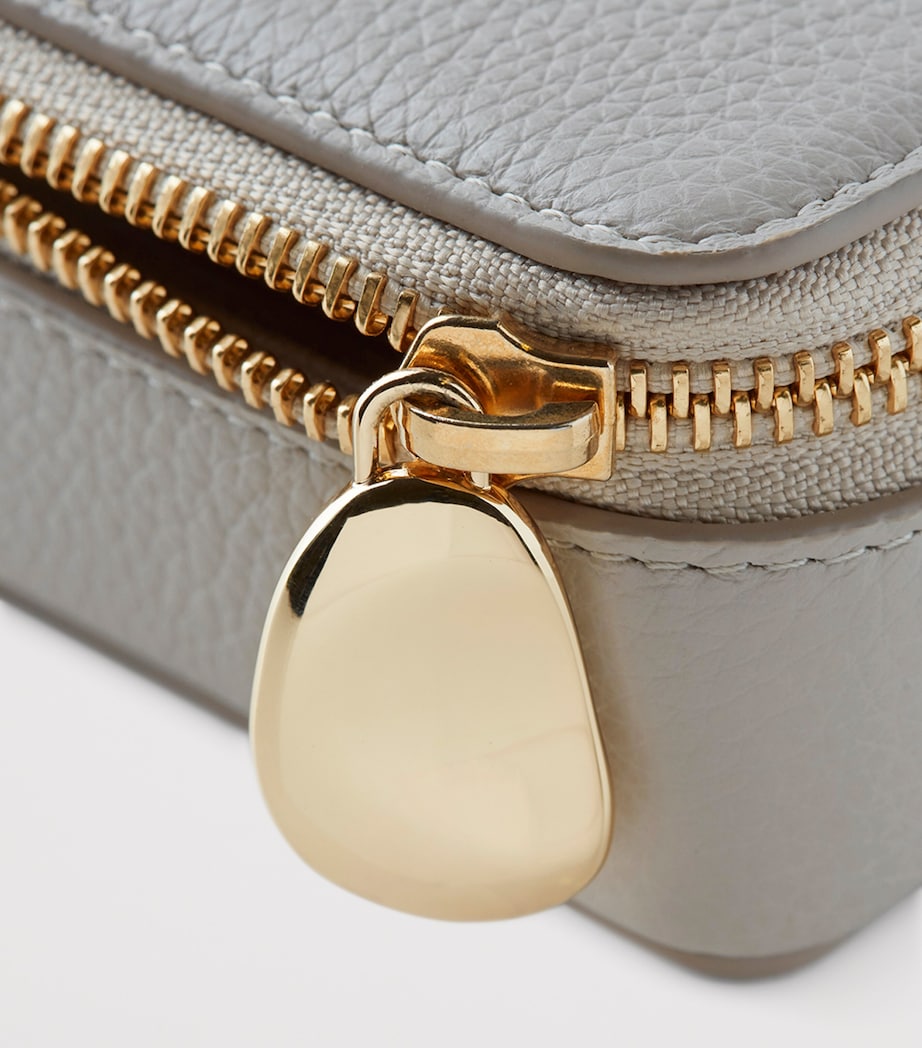 Monica Vinader compact leather jewellery box with zip fastening and multiple compartments, imported from the UK