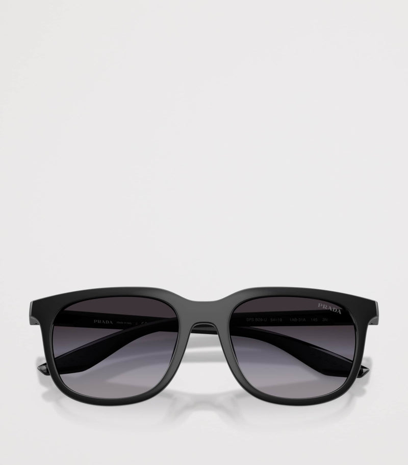 Prada Linea Rossa pillow sunglasses with tinted lenses, imported from the UK