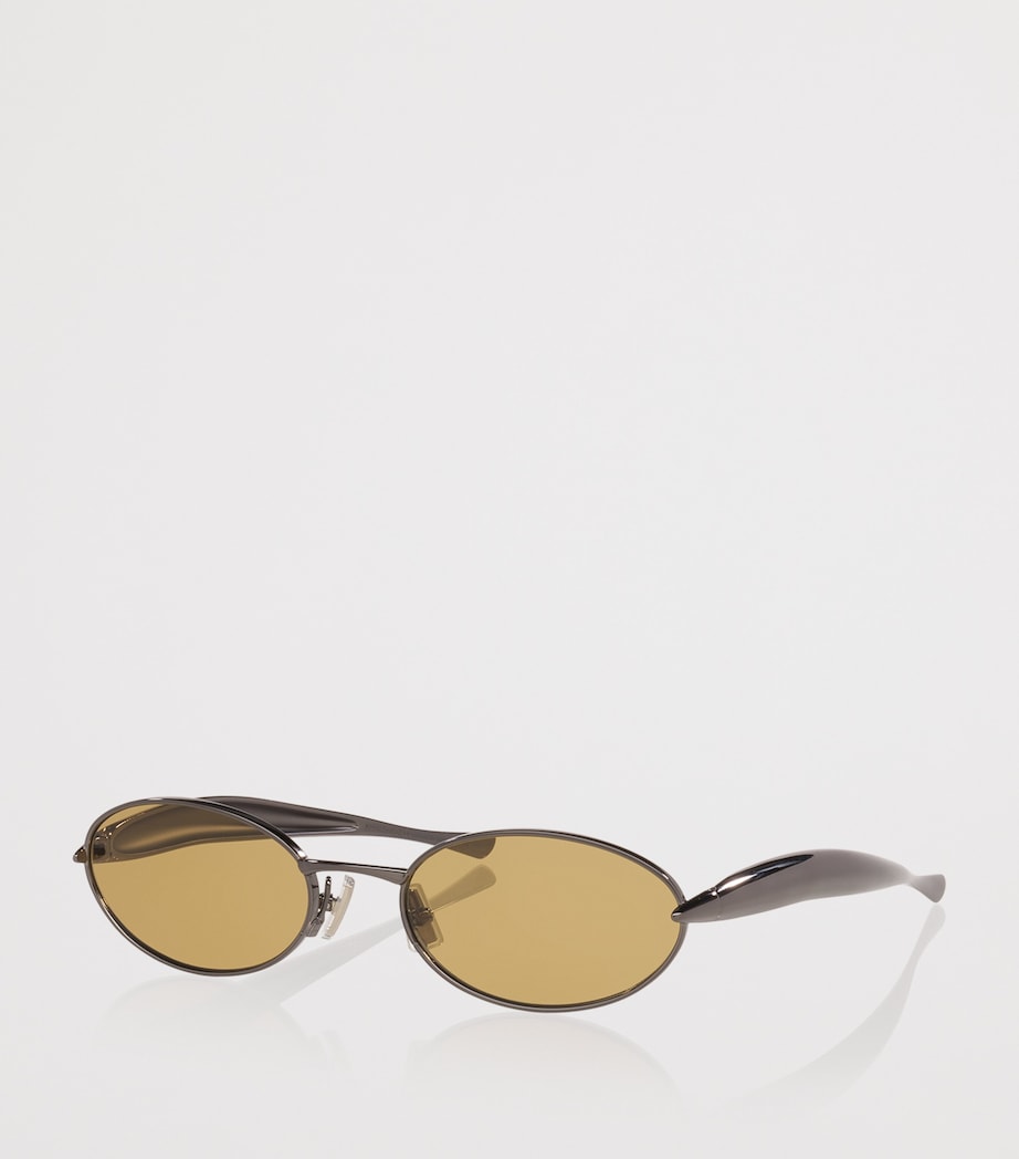 Bottega Veneta Oval Sardine sunglasses metal temples, imported from the UK