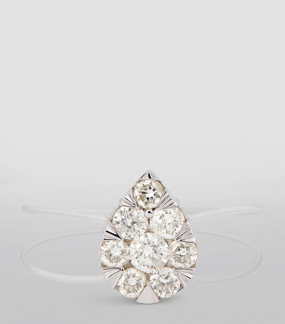 Persée white gold diamond floating ring (British brand)