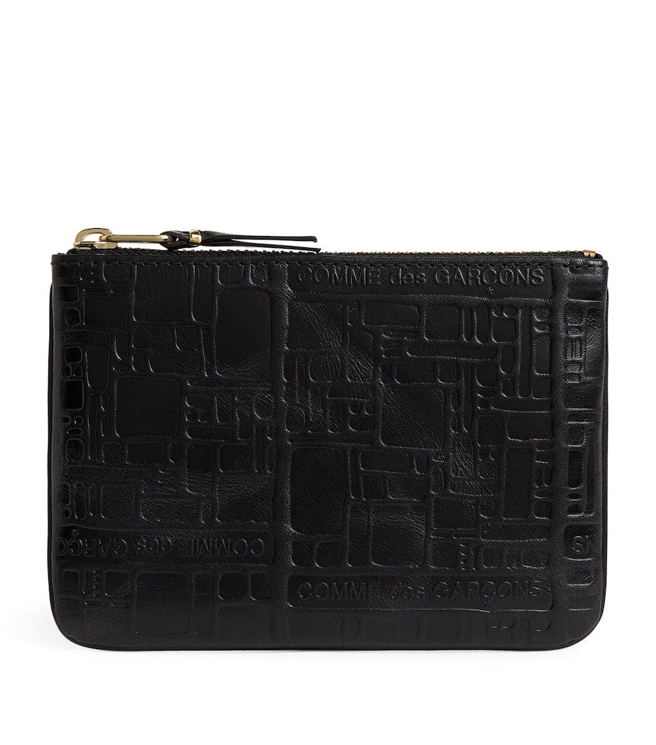 Comme Des Garçons leather embossed zipped pouch - British product