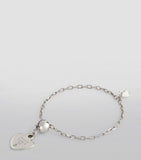 Persée white gold ring with floating diamond, UK version