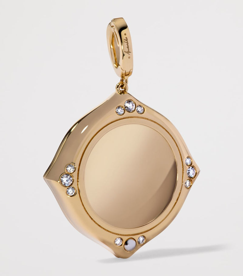Annoushka gold evil eye charm pendant with diamonds and sapphire, UK version