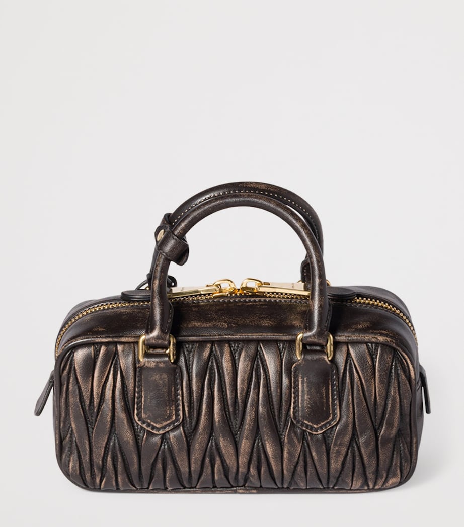 Miu Miu Arcadie top-handle bag matelassé leather, imported from the UK