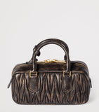 Miu Miu Arcadie top-handle bag matelassé leather, imported from the UK