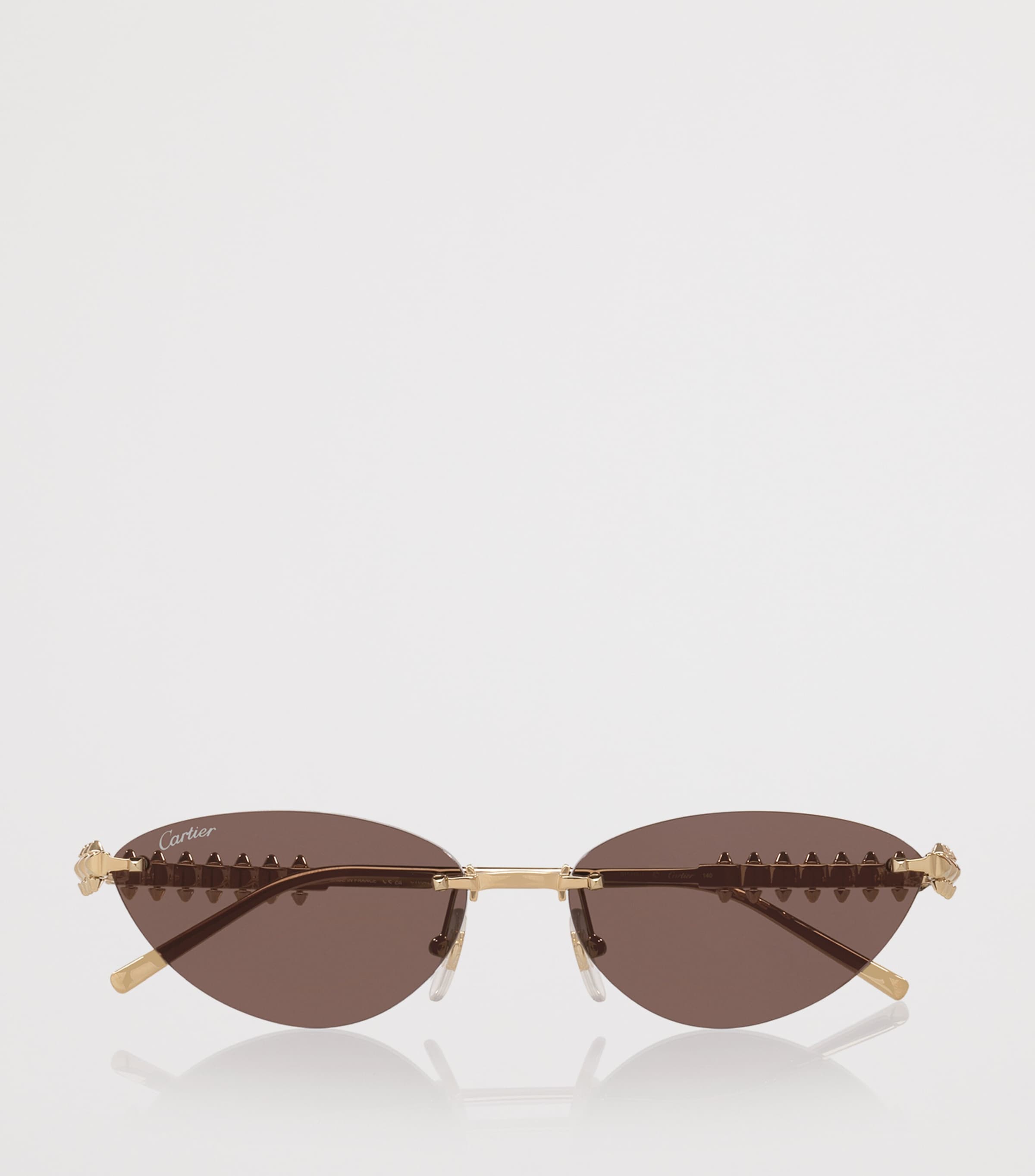 Cartier cat-eye sunglasses with gold-tone metal frames - British product