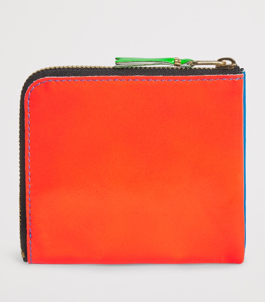 Comme des Garçons Wallet Super Fluo small leather wallet, UK version