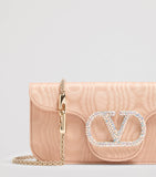 Valentino Garavani Moiré Locò clutch bag (British brand)
