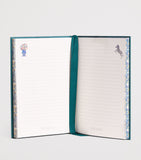 Harrods Enchanted Emporium hardback notebook with lined pages and marble-effect edges, 21x15.5cm, UK version