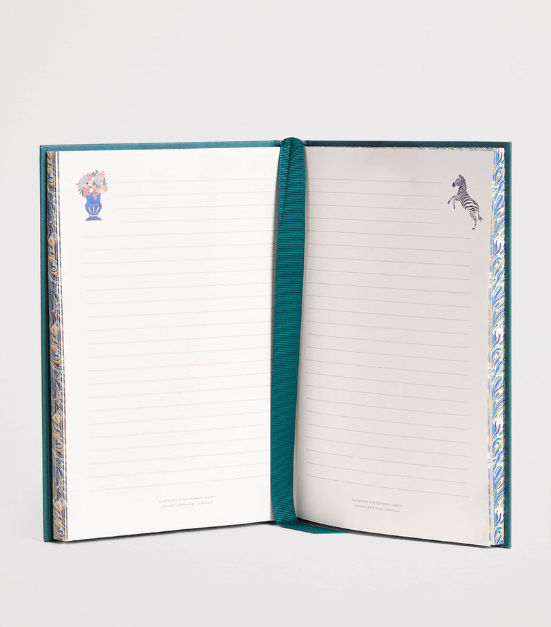 Harrods Enchanted Emporium hardback notebook with lined pages and marble-effect edges, 21x15.5cm, UK version