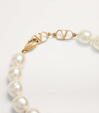 Valentino Garavani Coeur Royal beaded bracelet with heart pendant, imported from the UK