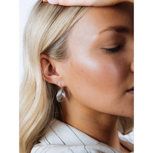 SVNX twisted ribbed hoop earrings in silver (British brand)