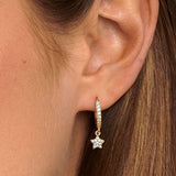MUCHV gold dangle hoop earrings with star charms, imported from the UK