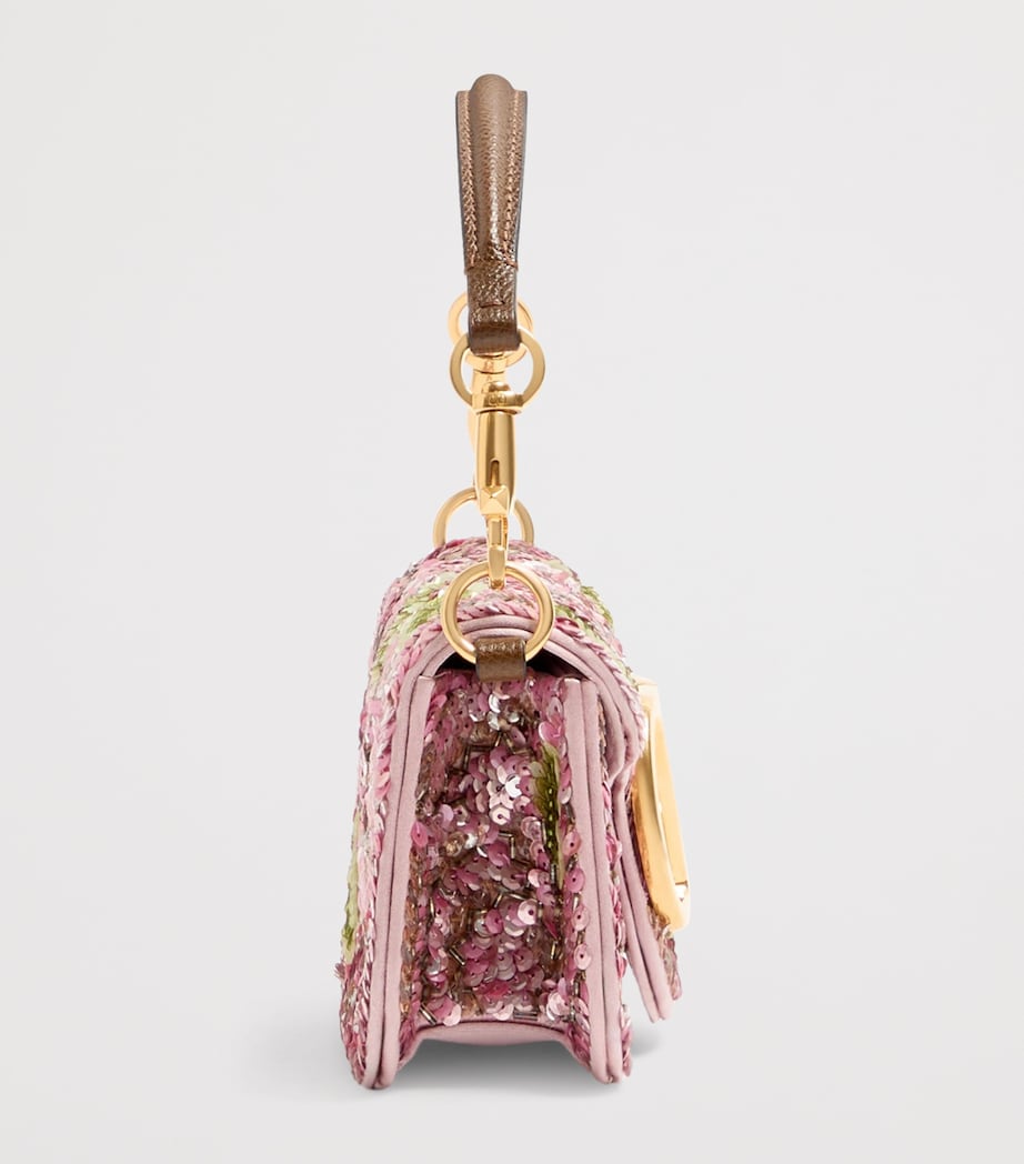 Valentino Garavani small Locò shoulder bag with sequins, imported from the UK