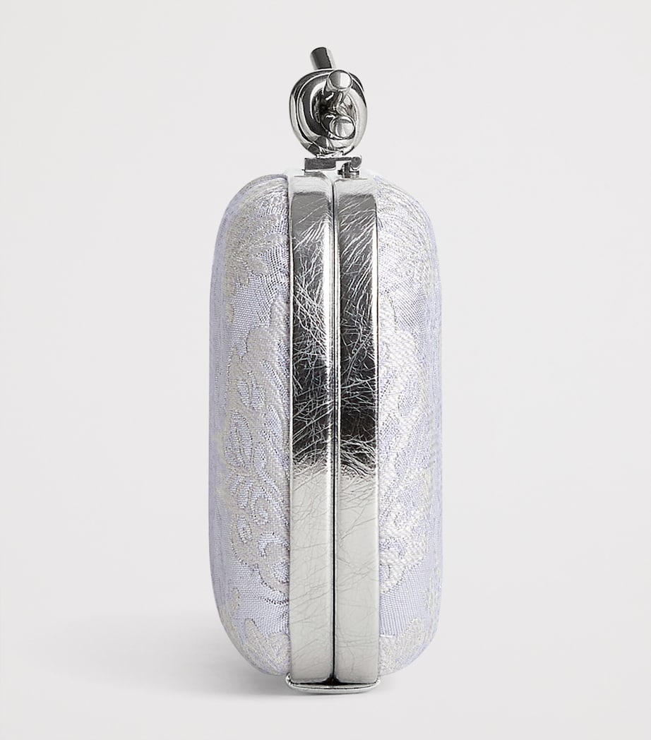 Bottega Veneta Jacquard Knot lurex clutch bag, imported from the UK