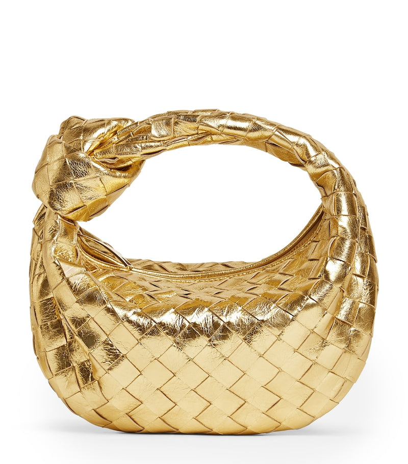 Bottega Veneta mini metallic leather top-handle bag, imported from the UK