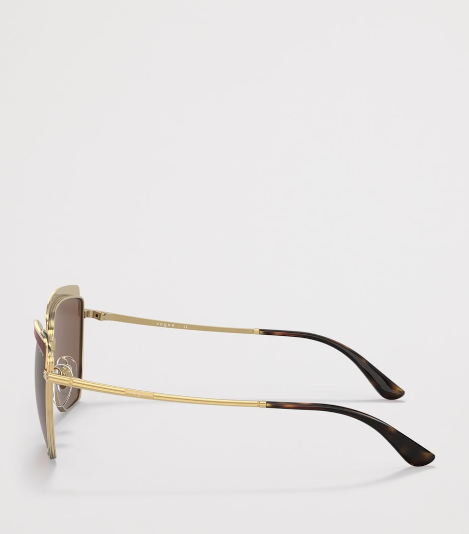 Vogue metal irregular sunglasses with oversized cat-eye design, UK version