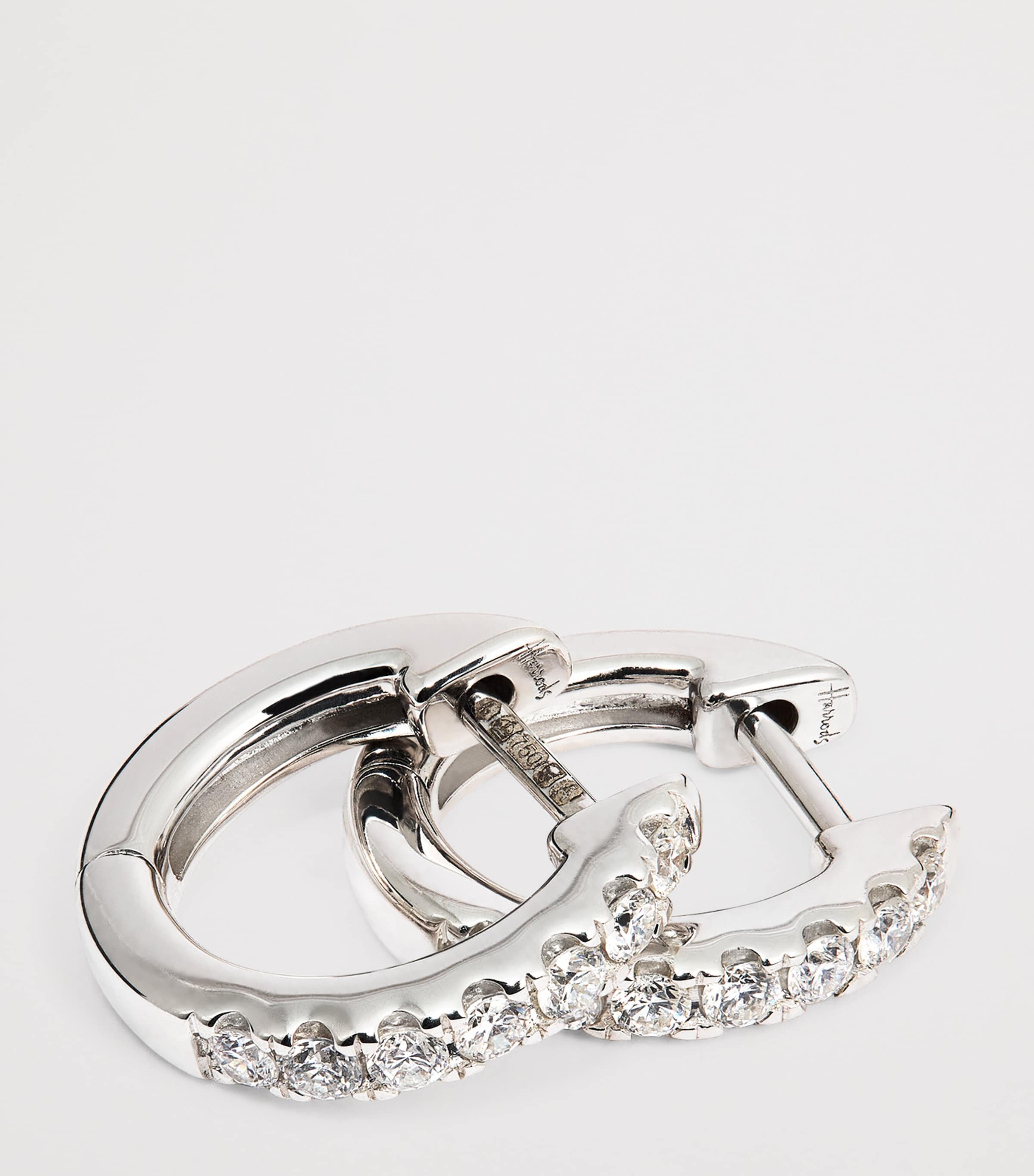 Harrods white gold diamond huggie earrings 0.20ctw, imported from the UK