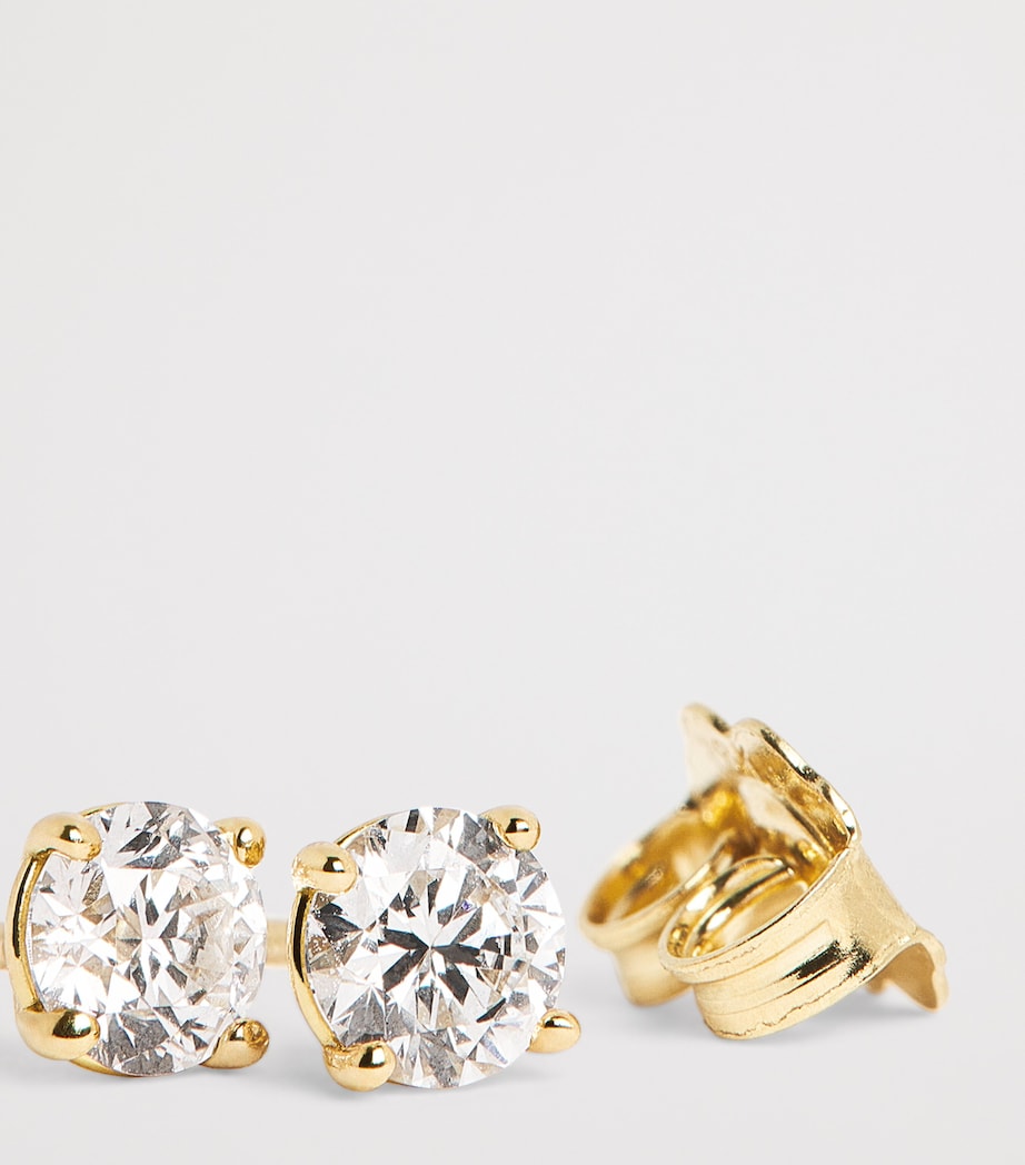Harrods diamond stud earrings 18kt yellow gold 0.50ct, imported from the UK