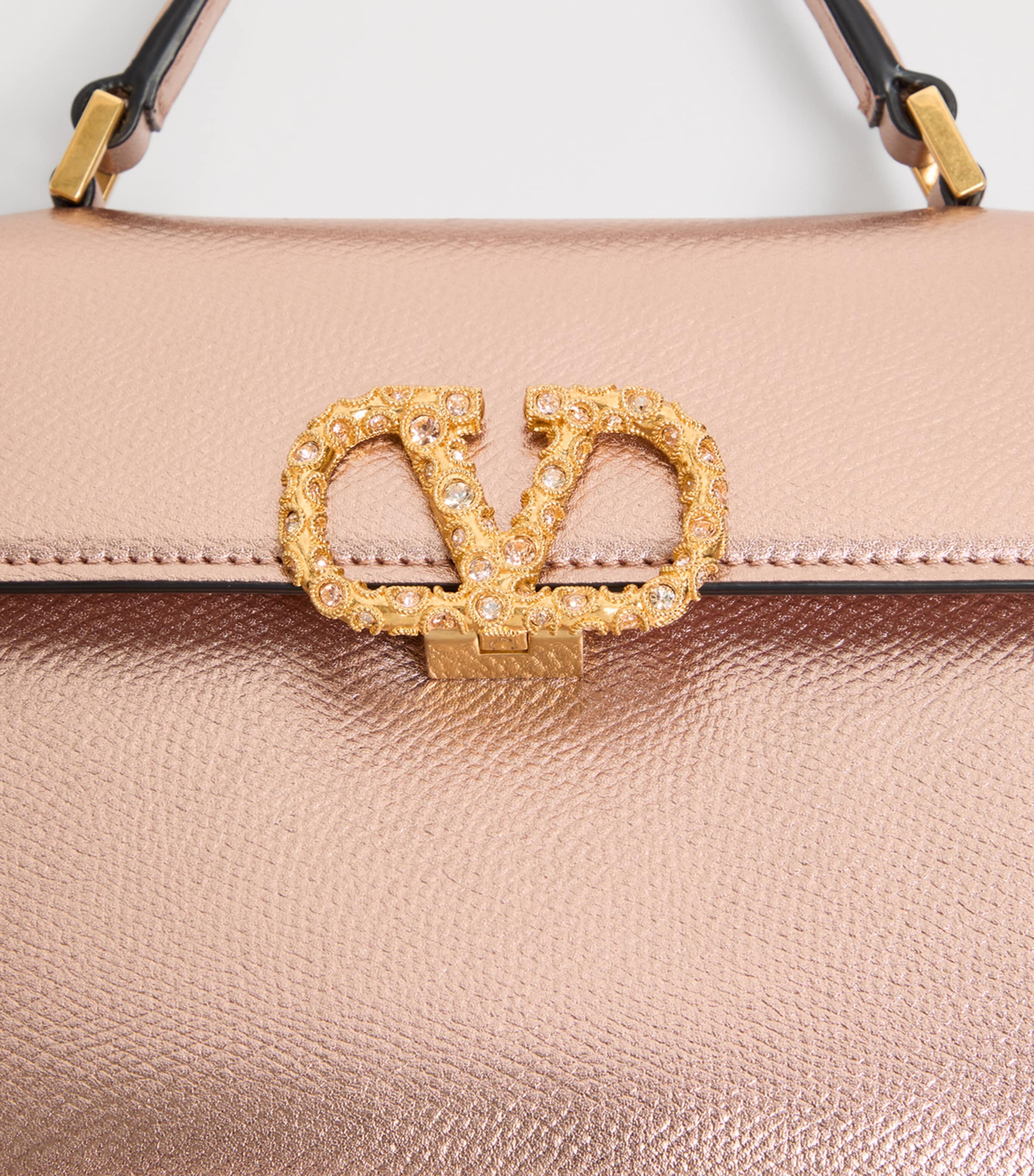 Valentino Garavani VSLING mini top-handle bag - British product