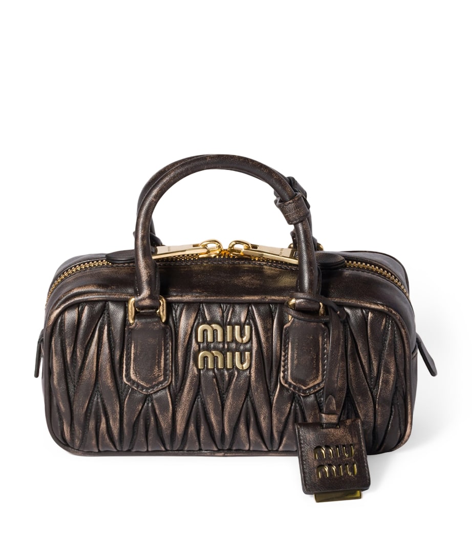 Miu Miu Arcadie top-handle bag matelassé leather, imported from the UK
