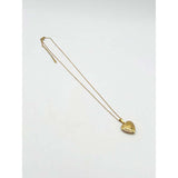 SVNX large heart locket necklace in gold (British brand)