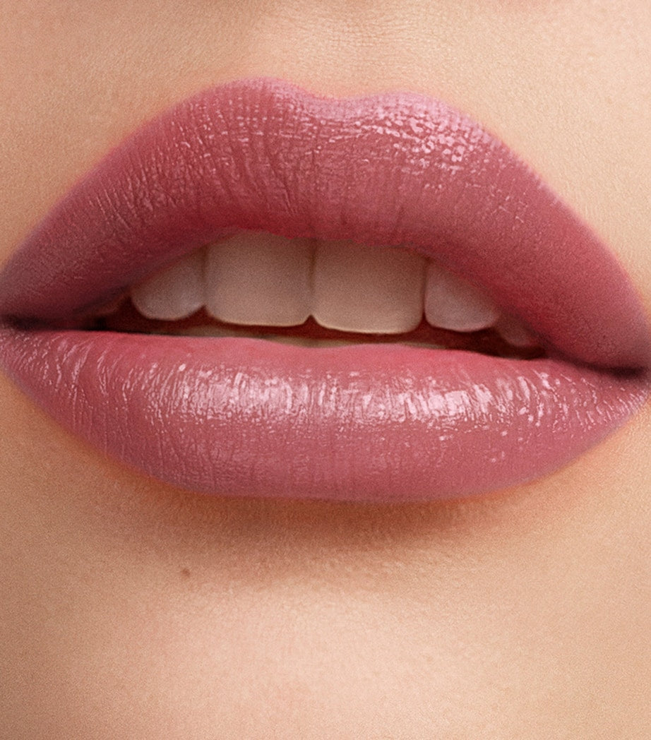Carolina Herrera mini tinted lip balm with sheer finish (British brand)