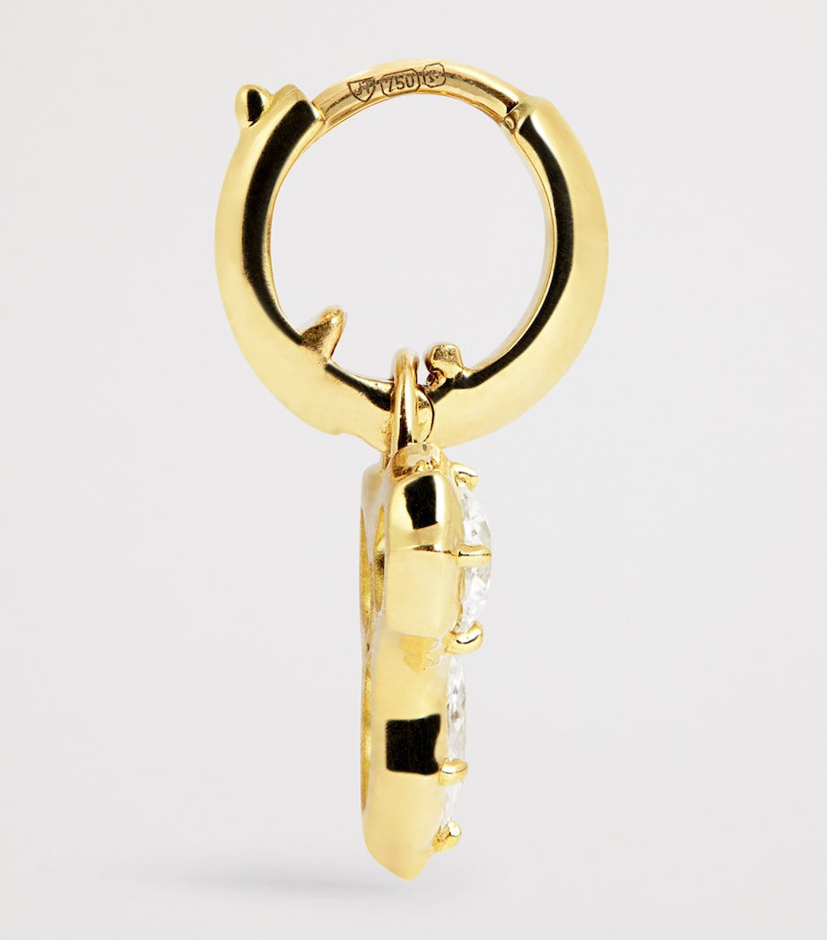 Jade Trau Poppy huggie earrings in yellow gold with diamonds, imported from the UK