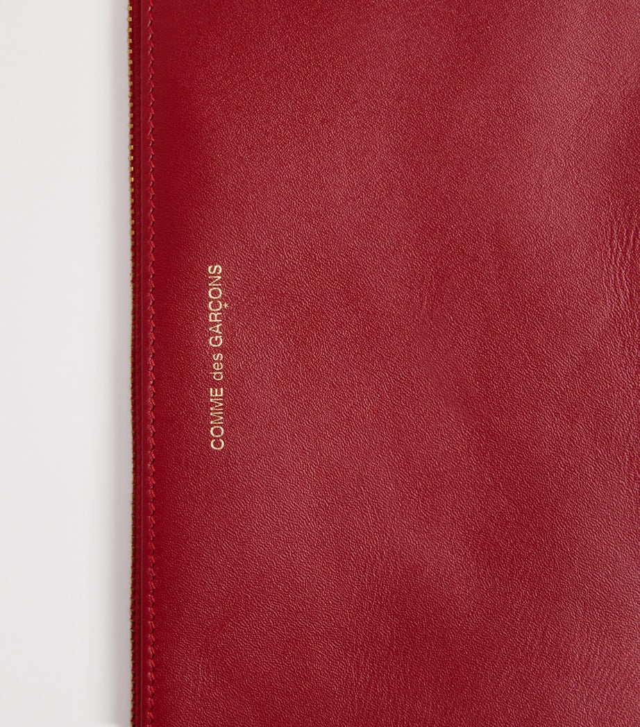 Comme des Garçons large leather zipped pouch - British product