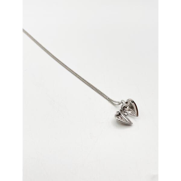 SVNX small heart locket necklace in silver, UK version