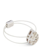 Persée white gold diamond floating ring (British brand)