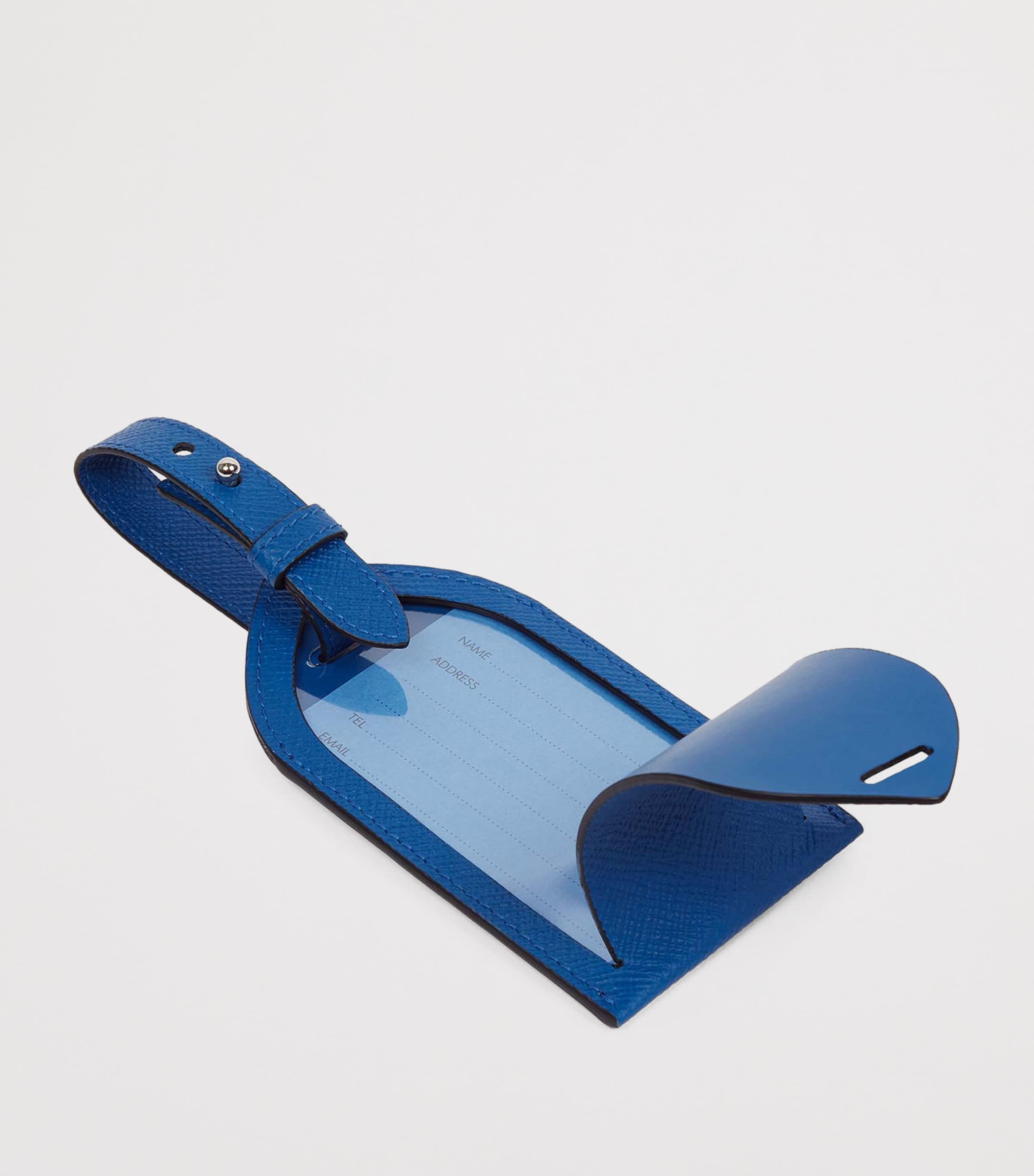 Smythson leather luggage tag with press-stud fastening and adjustable strap 12.5cm x 7cm (British brand)