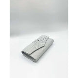 SVNX ruched bow clutch bag in silver (British brand)